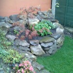 A curved dry stone wall